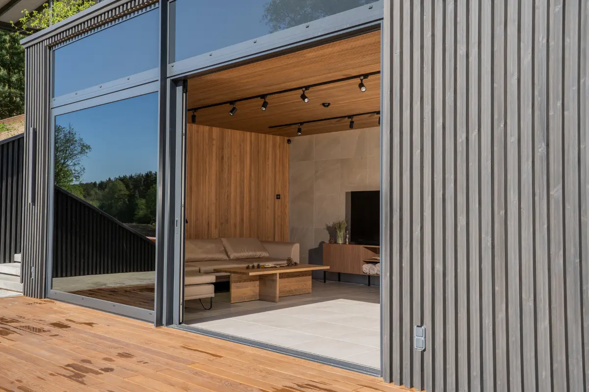 Thermo wood cladding for exterior and interior – texture and color differences in one modern space