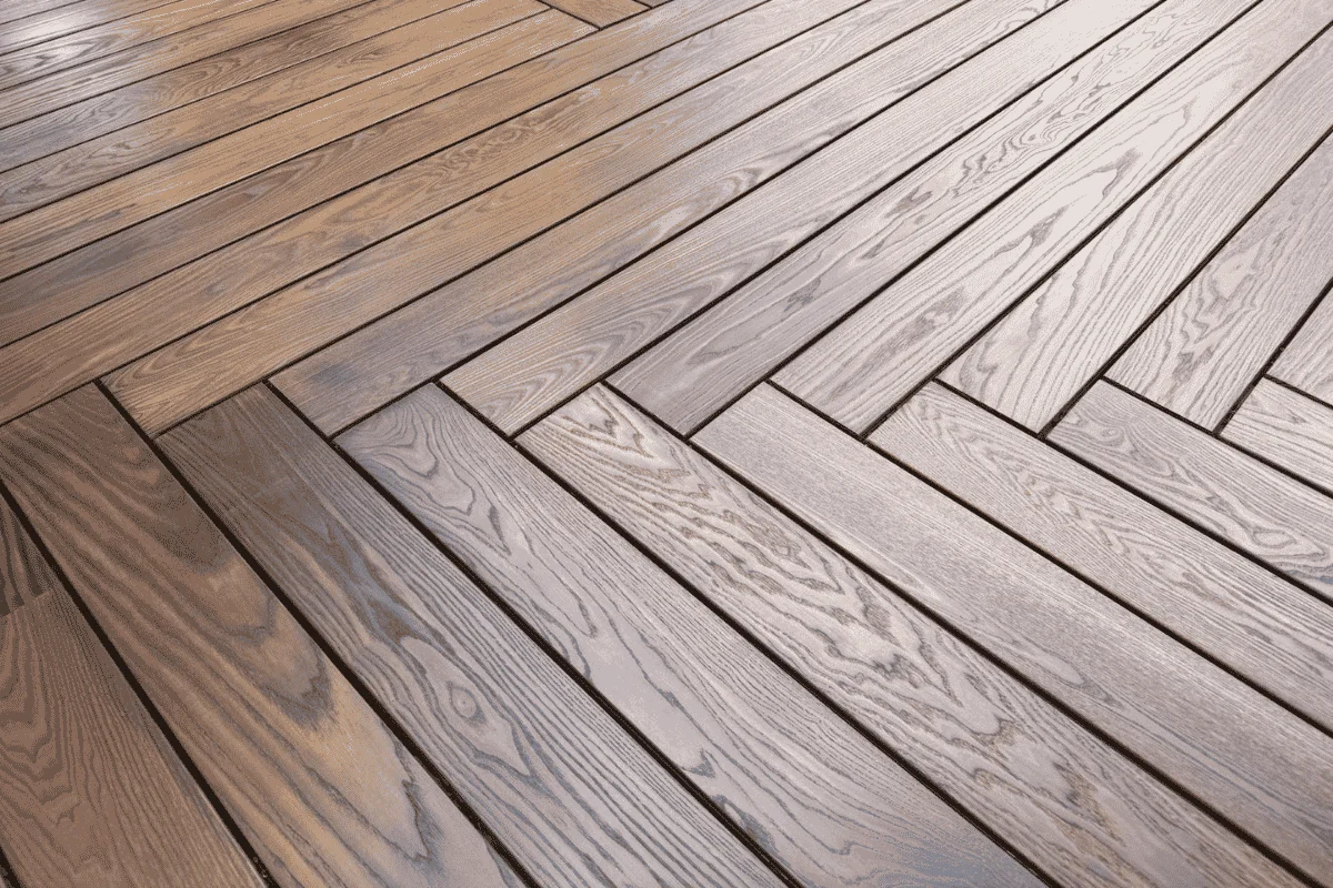 Thermally modified wood decking boards installed in a modern herringbone terrace pattern.