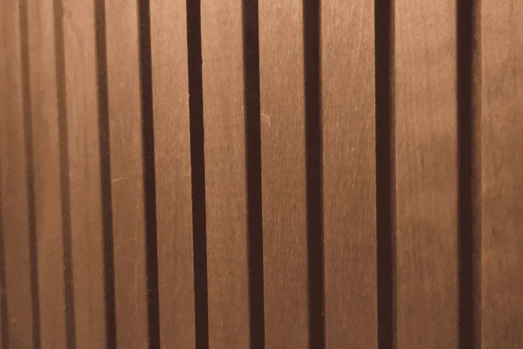 How to Use Wood Wall Paneling to Define Zones in an Open Plan Home