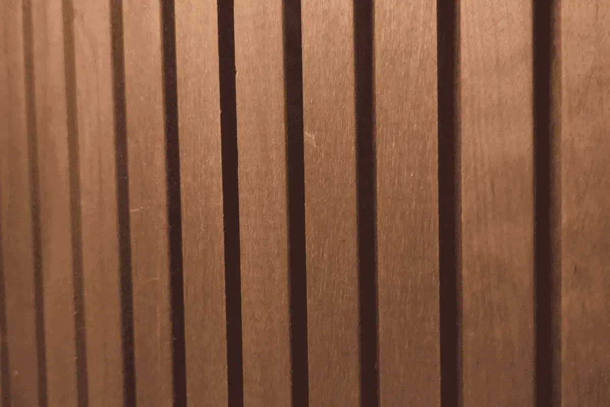 Vertical wood wall paneling with a textured profile